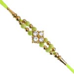 Green velvet stone rakhi