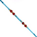 Blue Japanese stone with red Pearls rakhi